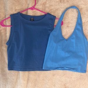 Two blue tops! Sold together. Size medium and small.